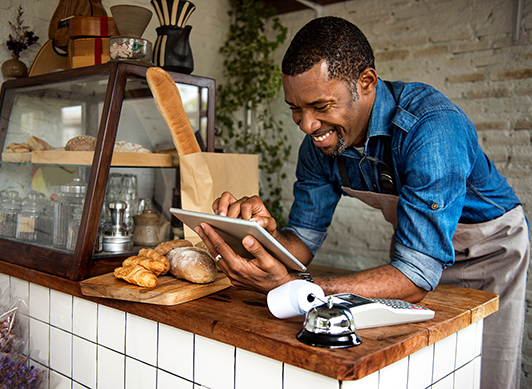 man working on tablet